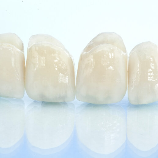 Row of teeth against white background